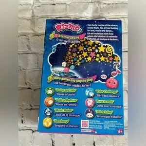 Tomy | Toys | Rizmo Evolving Musical Friend Interactive Plush Toy With ...